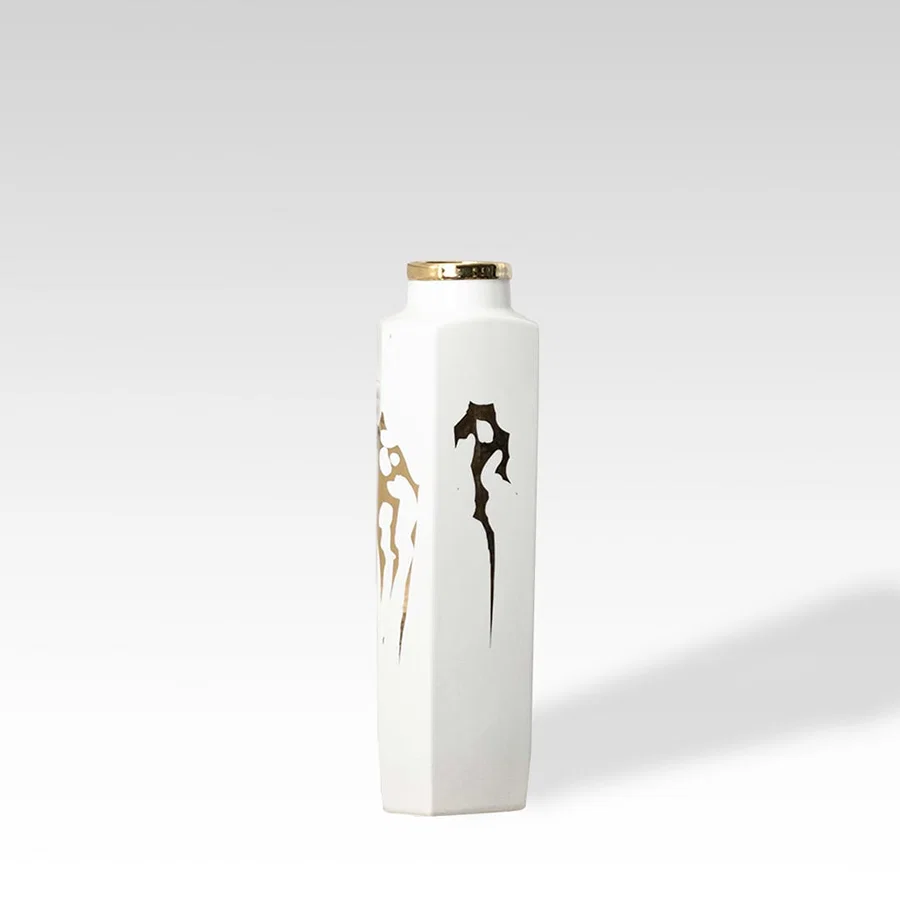 Tall white ceramic jar with gold horse artwork perfect for luxury décor styling and contemporary living room accents.