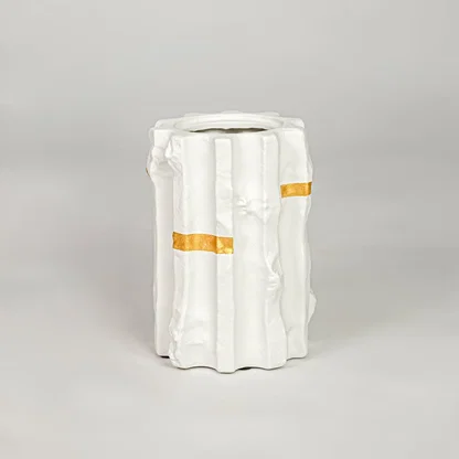 White ceramic decorative vase with gold accent modern flower vase for shelf console table living room home decor styling.