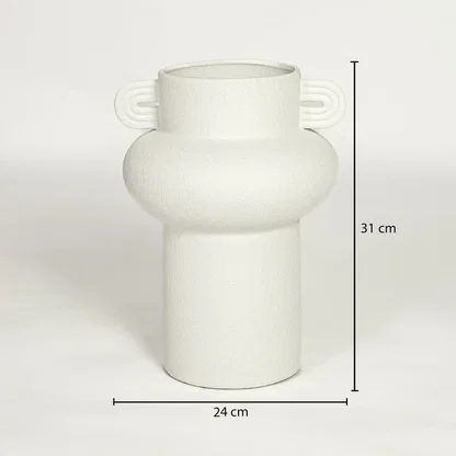 White ceramic decorative vase with sculptural handles showing 31 cm height and 24 cm width suitable for table or console placement.