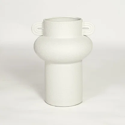 Minimal white ceramic statement vase with side handles designed for living room table console or shelf styling on clean background.