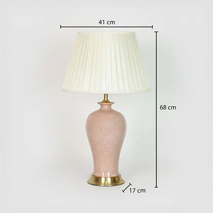 Pink ceramic table lamp showing 68 cm height 41 cm shade width and 17 cm base size ideal for bedroom placement.