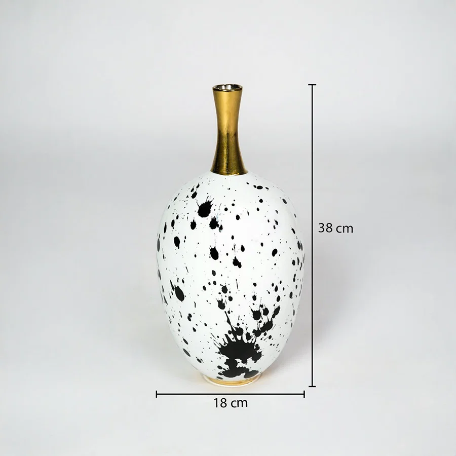 White and black ceramic vase with gold neck dimension image with 39 cm height and 18 cm width for decor.
