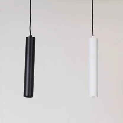 Pair of black and white metal pendant lights designed for elegant bedroom and dining room decor.