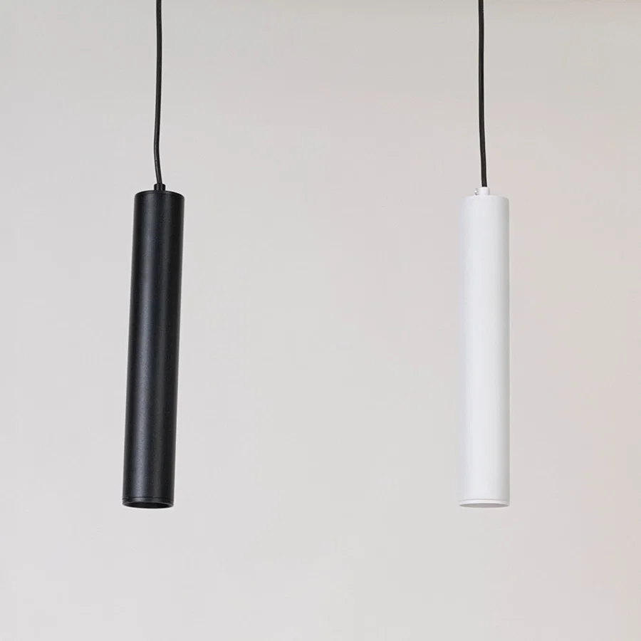 Pair of black and white metal pendant lights designed for elegant bedroom and dining room decor.