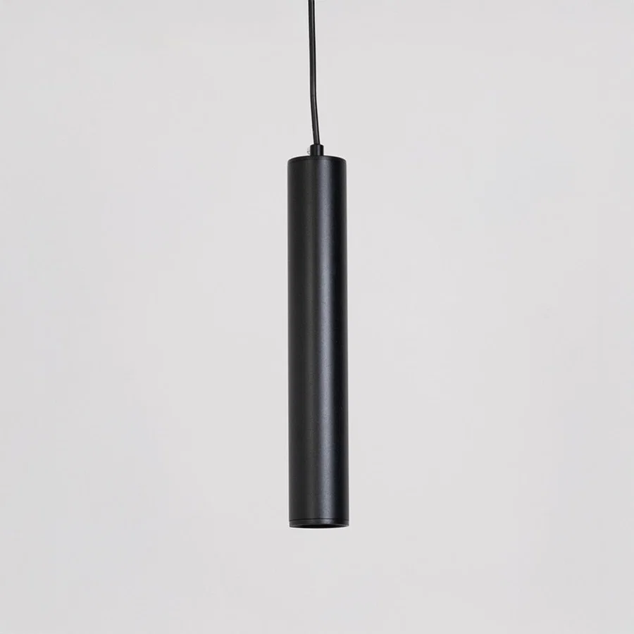 Modern pendant light in black finish with cylindrical design for kitchen island or dining decor lighting white background.