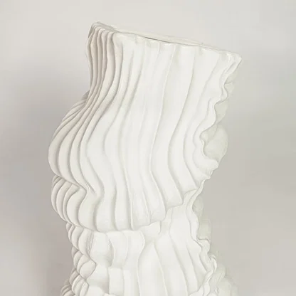 White ceramic abstract textured vase with artistic wave pattern perfect for elegant dried flower display and modern interior decor styling.