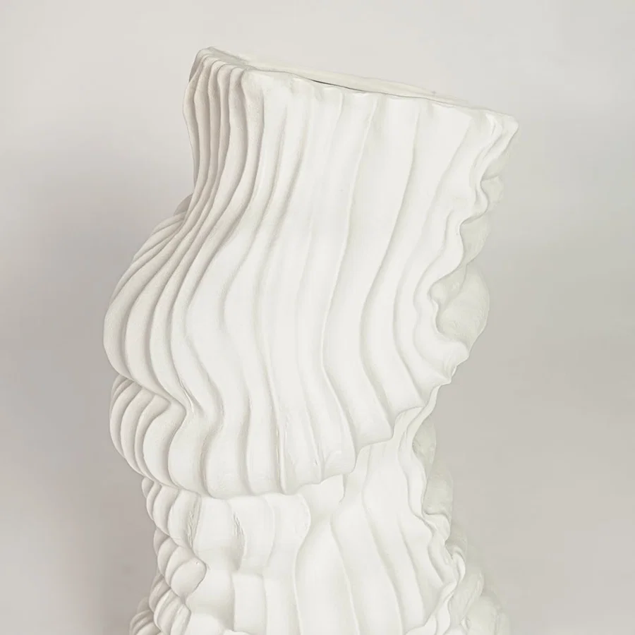 White ceramic abstract textured vase with artistic wave pattern perfect for elegant dried flower display and modern interior decor styling.