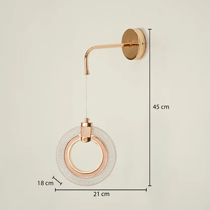Modern gold wall light measuring 45 cm height 21 cm width and 18 cm depth on white background.
