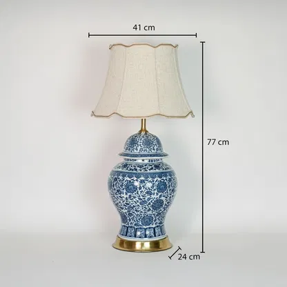 Blue white ceramic table lamp showing 77 cm height 41 cm shade width and 24 cm base size for floor or console use.