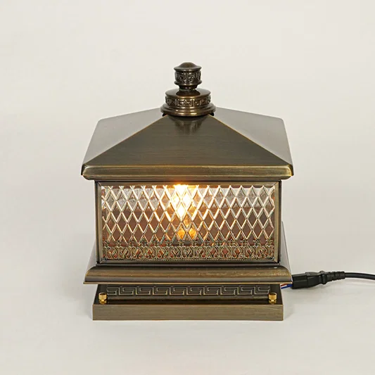 Vintage style outdoor pillar light with textured glass panels and metal top on neutral background perfect for classic exterior decor lighting.