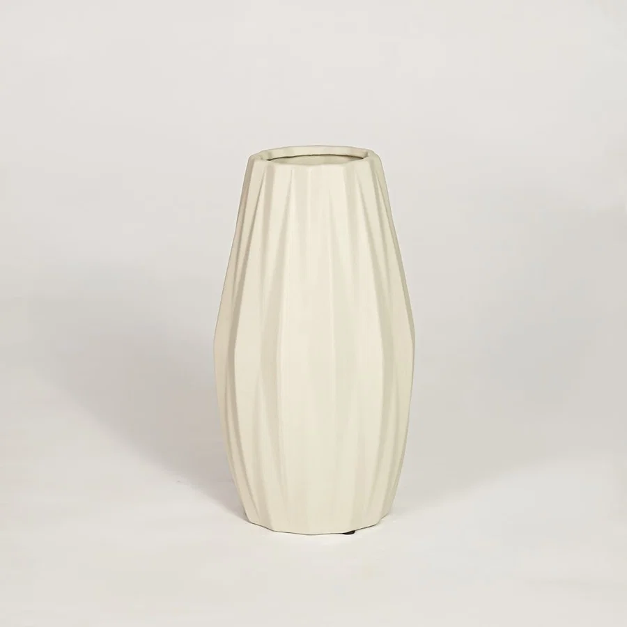 Modern beige ceramic fluted decorative vase ideal for dried flower arrangement on console table shelf and stylish home decor.