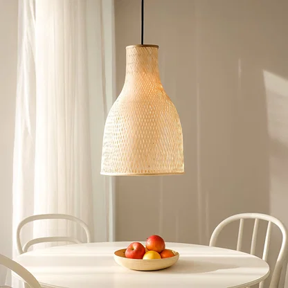Natural rattan pendant light above dining table adding soft bohemian charm and warm lighting.
