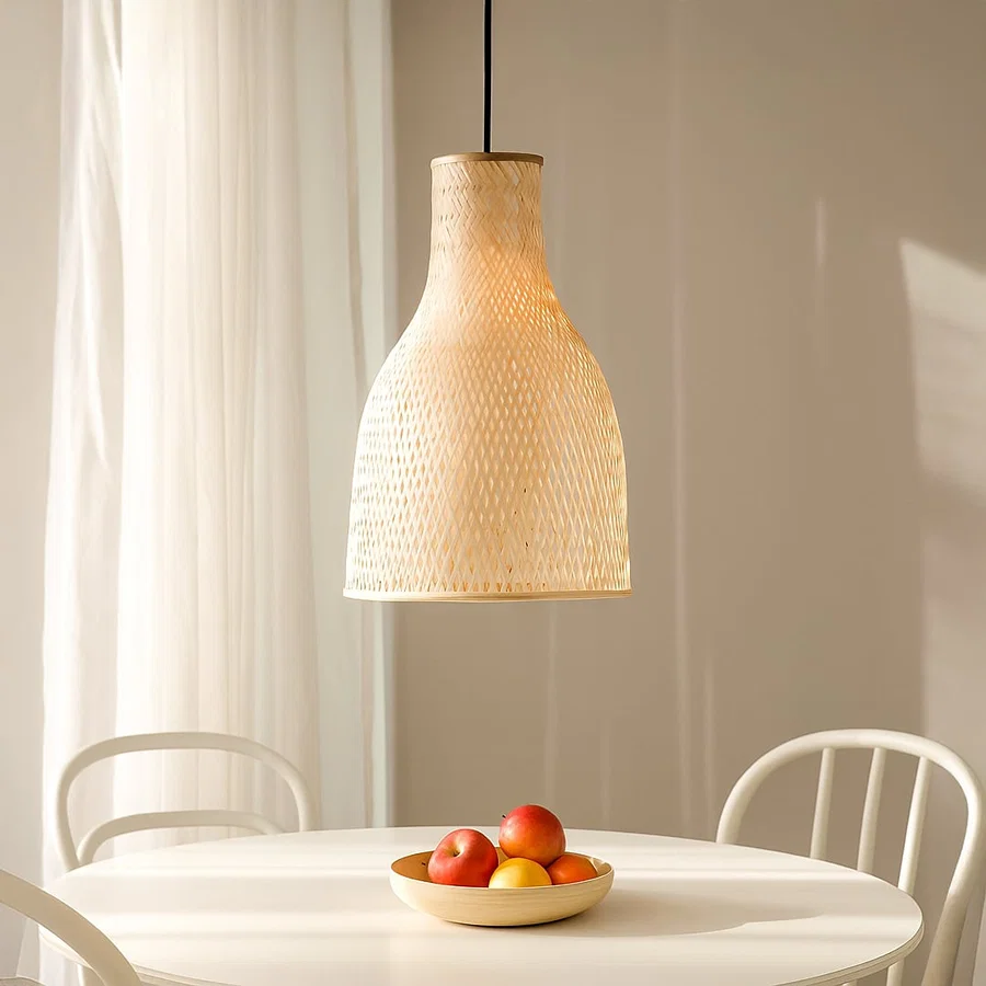 Natural rattan pendant light above dining table adding soft bohemian charm and warm lighting.