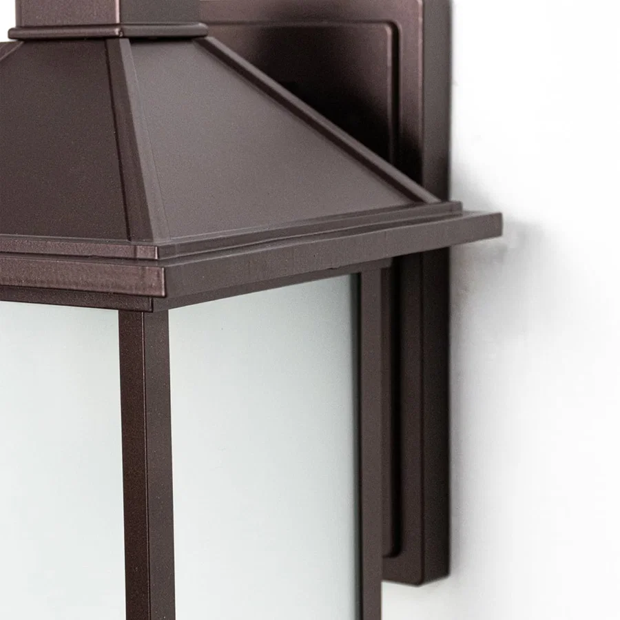 Closeup of Dorm outdoor wall light crafted in metal displaying sturdy structure refined finish and functional exterior wall lighting style.