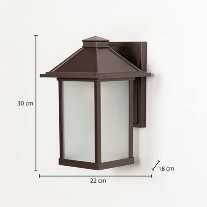 Brown metal outdoor wall lantern measuring 30 cm height 22 cm width and 18 cm depth designed for exterior wall mounting.