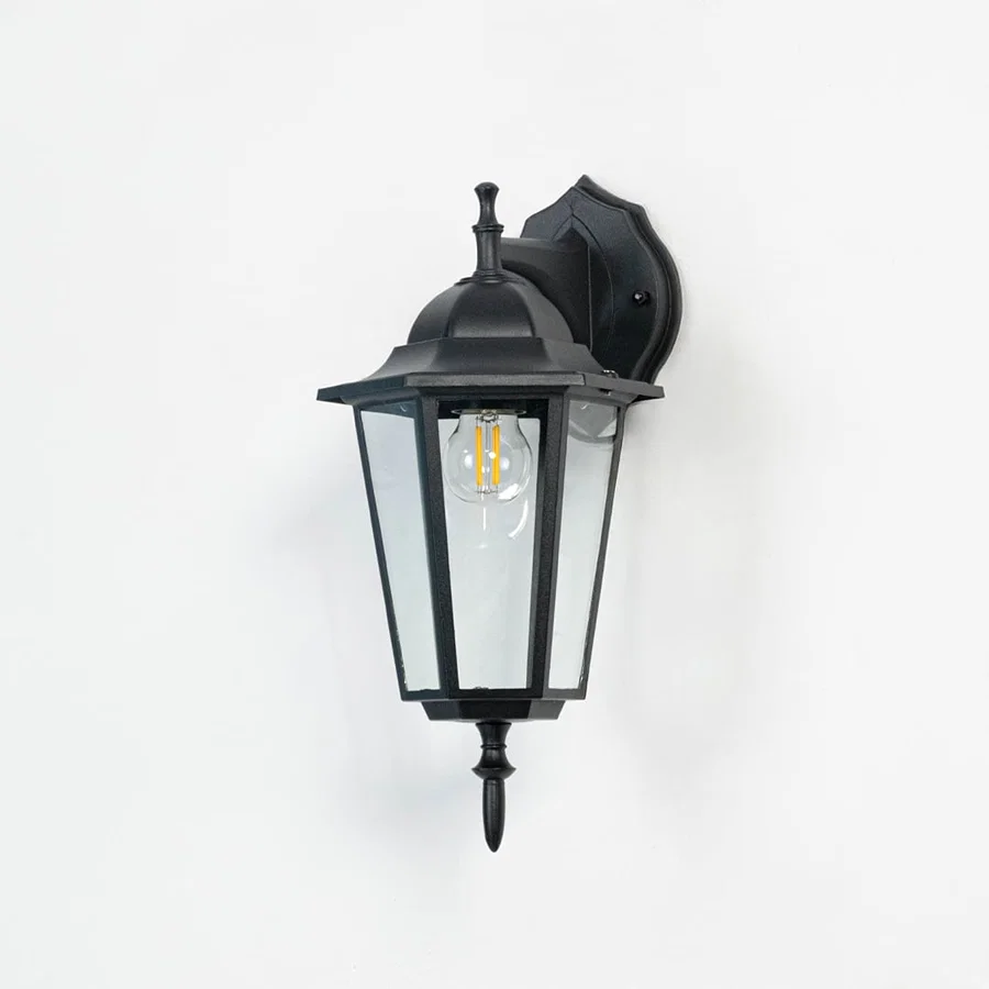 Unlit outdoor wall light in matte black finish displayed on white background highlighting smooth frame and crisp structure.