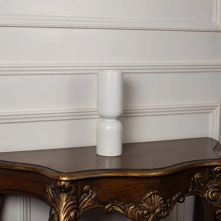 Minimalist matte white stacked ceramic totem vase displayed on a classic wooden console table for an elegant home decor.
