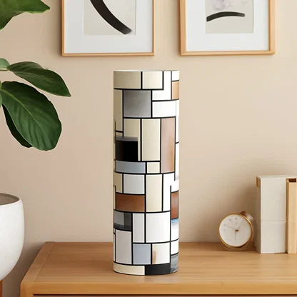 Modern white sculptural ceramic vase styled in a soft minimal room setting adding artistic elegance to contemporary home decor.