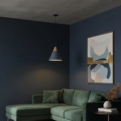 Blue metal pendant light above sofa adding Scandinavian elegance and warm ambient lighting to modern interiors.