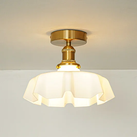 Modern cream glass and gold metal ceiling light for stylish hallway and vintage inspired decor styling spaces.