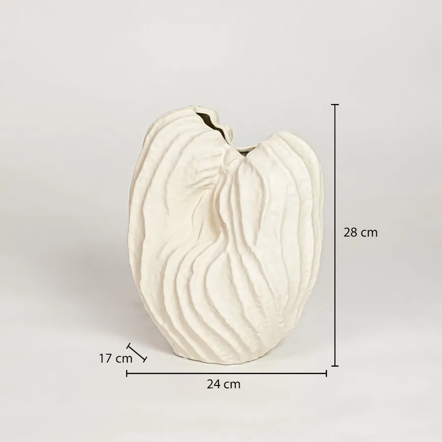 White ceramic sculpted leaf design vase measuring 28 cm height 24 cm width and 17 cm depth ideal for modern decor styling.