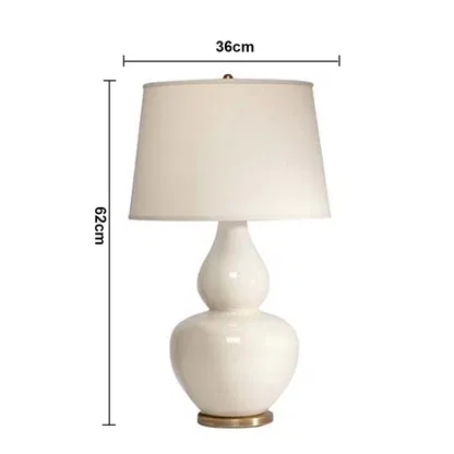 White shade white ceramic table lamp with size 53cm height and 36cm width on plain background for modern minimal décor.