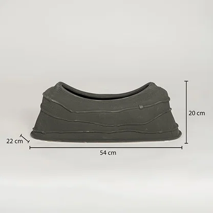 Black ceramic decorative serving bowl showing 54 cm length 22 cm width and 20 cm height ideal for dining table centerpiece decor.