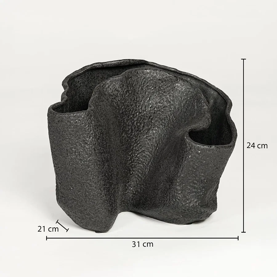 Black textured metal decorative vase measuring 24 cm height 31 cm width and 21 cm depth ideal for modern interior decor styling.