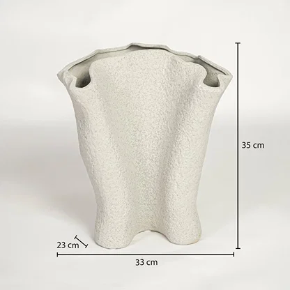 Light beige ceramic decorative vase showing 35 cm height 33 cm width and 23 cm depth suitable for floor or console placement.
