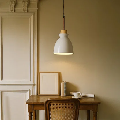 White metal pendant light above study desk adding Scandinavian elegance and warm ambient lighting to interiors.