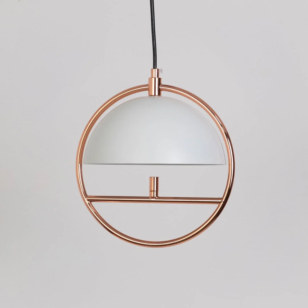 Detailed view of black metal and copper pendant light showcasing refined finish and unique design.