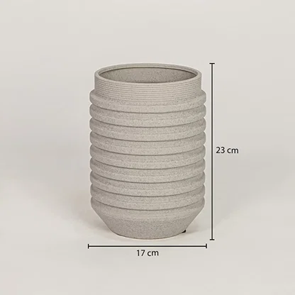 Beige ceramic decorative vase measuring 23 cm height and 17 cm width for modern tabletop decor placement.