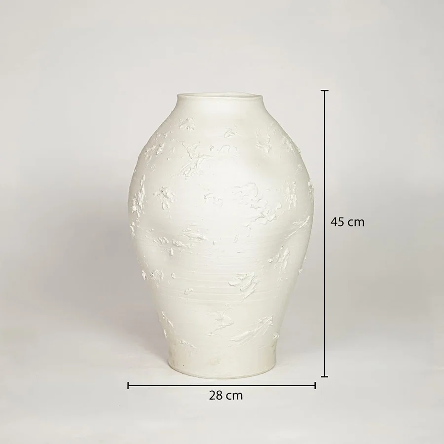 White ceramic decorative floor vase showing 28 cm width and 45 cm height ideal for living room floor decor display.