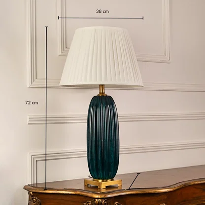 Blue ribbed glass table lamp with pleated fabric shade measuring 73 cm height and 28 cm width for luxury interiors.
