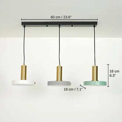 Three-light linear ceiling pendant fixture with black ceiling mount, black cords, gold cylindrical shades, and round white, gray, and mint green lamp shades. Measurement labels show, 16 x 60 x 18 cm (6.3 x 23.6 x 7.1 inches) dimensions