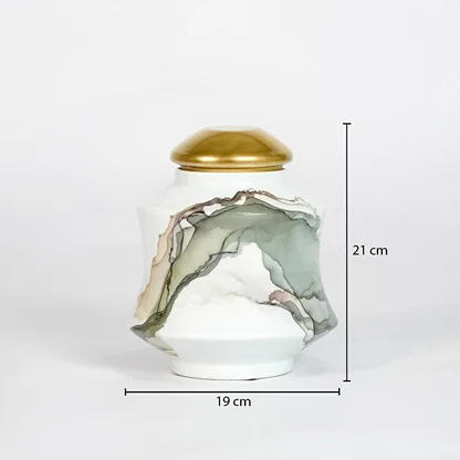 Decorative jar with a gold lid and marbled design, shown with measurements on a white background.