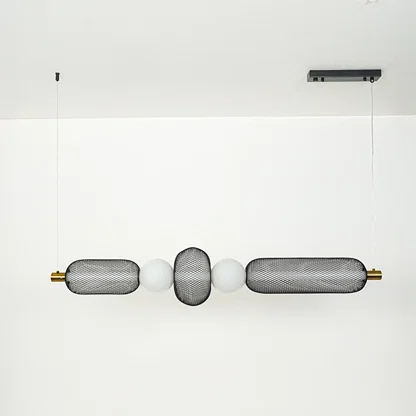 Modern wall light with textured glass cylinders and metal accents mounted on neutral wall background ideal for contemporary bathroom or hallway lighting.