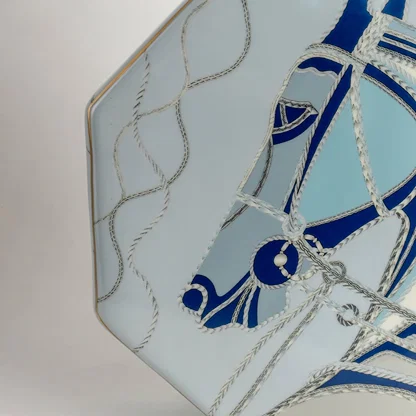 White ceramic jar with blue abstract horse artwork in a close-up view perfect for artistic décor and modern console styling.