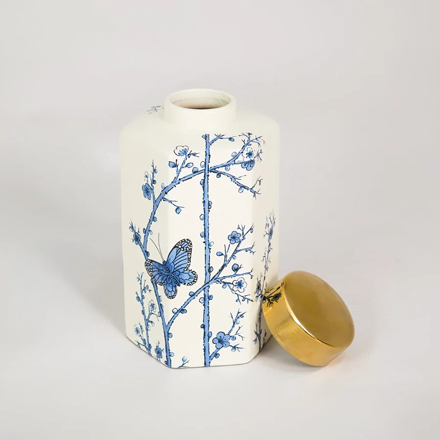 White background image of small mediterranean style jar for modern living room decor styling with elegant finish.