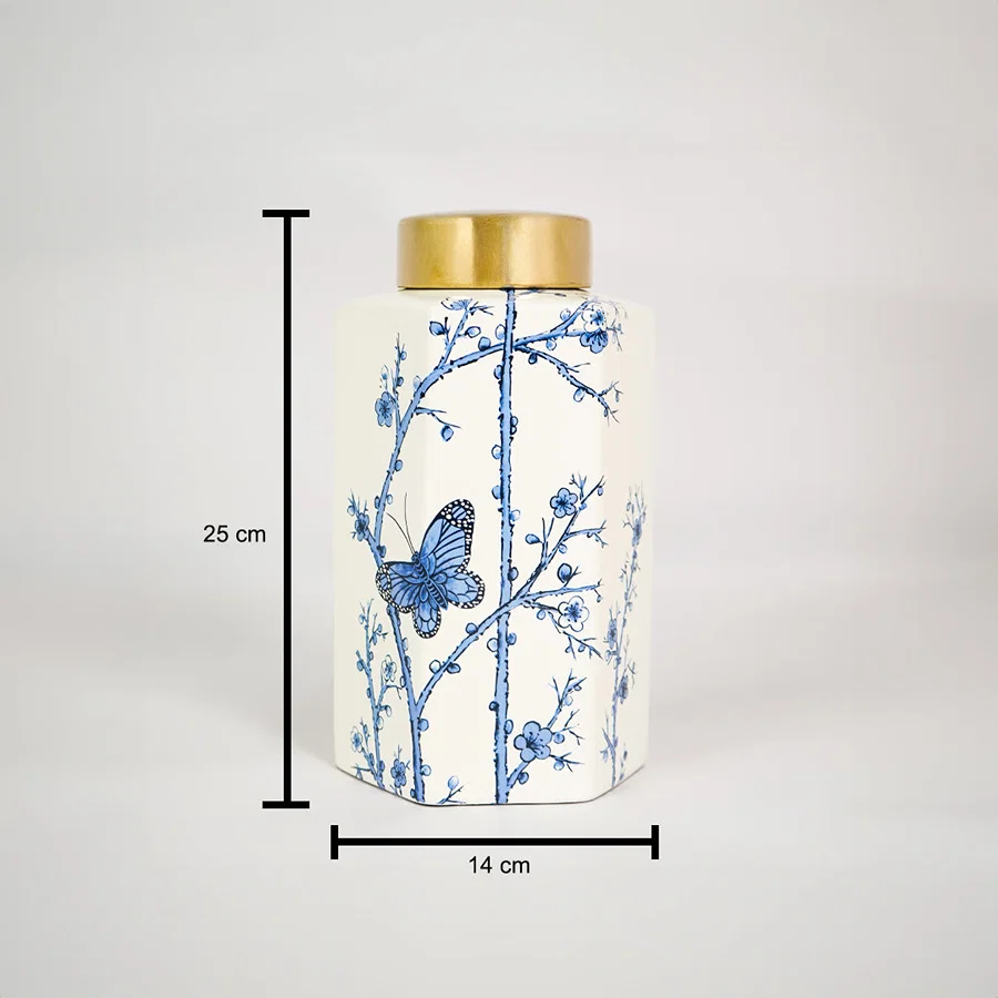 Blue and white ceramic ginger jar with gold lid for tabletop shelf or console décor showing product dimensions.