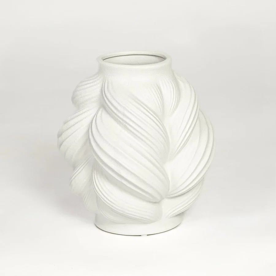 White ceramic sculpted leaf design vase with layered curved pattern isolated on clean white background for modern decor styling.