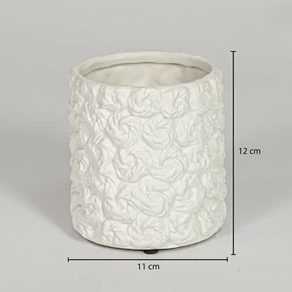 Dimension image of matte white ceramic cylindrical planter pot with a textured swirling rose pattern showing 12 cm height and 11 cm width.