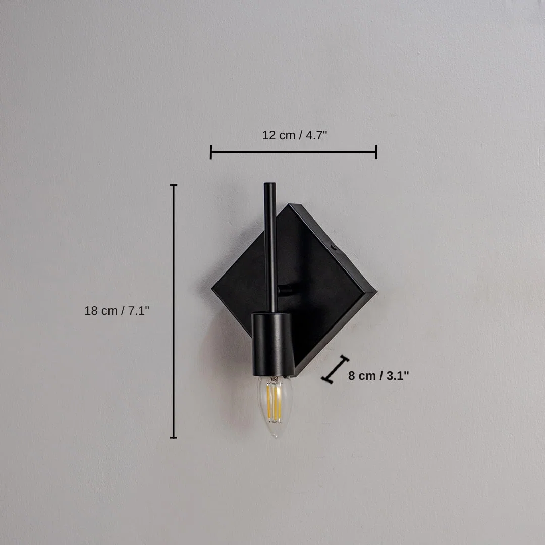 Black wall light with gold bulb holder and circular frame, 18 x 12 x 8 cm (7.1 x 4.7 x 3.1 inches) dimensions