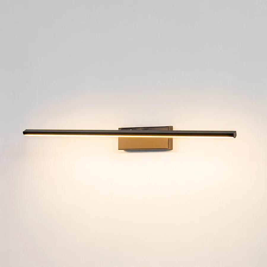Minimal wall light in gold metal finish with linear bar design for bathroom or vanity decor lighting white background.
