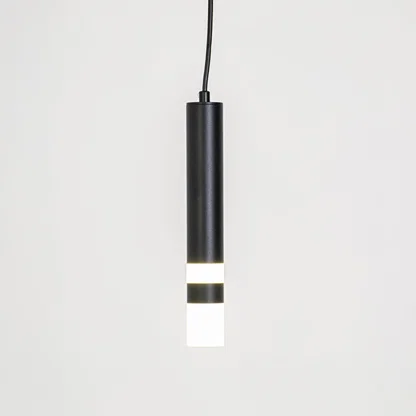Minimal pendant light in black metal finish with cylindrical tube design for kitchen or dining decor lighting white background.