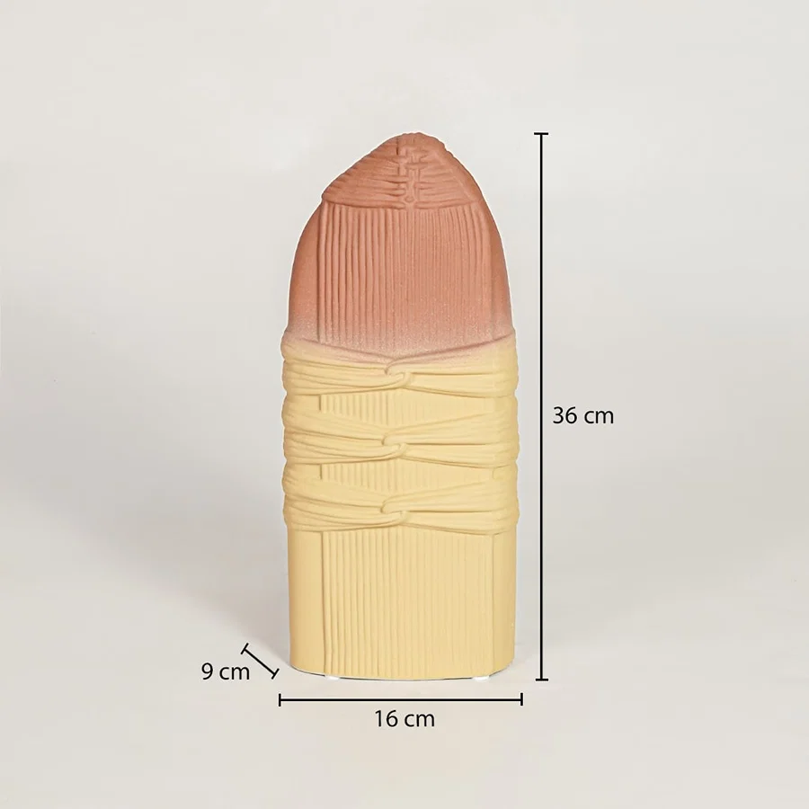 Peach and yellow ceramic sculpted vase measuring 36 cm height 16 cm width and 9 cm depth ideal for statement decor display.