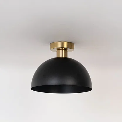 Black ceiling light with gold base and dome shade in off mode displayed on clean white background for modern ceiling decor.