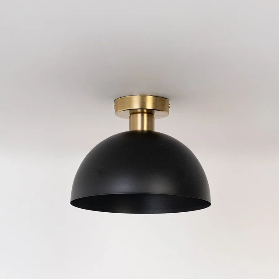 Black ceiling light with gold base and dome shade in off mode displayed on clean white background for modern ceiling decor.