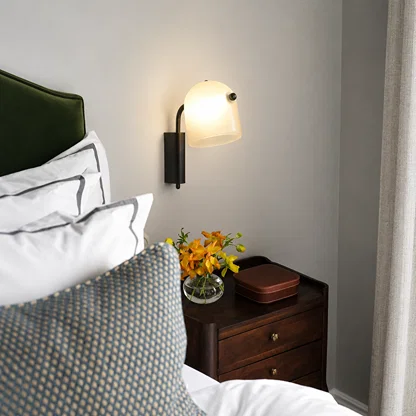 Lifestyle image of white mona wall light for elegant living room decor styling and modern home lighting.