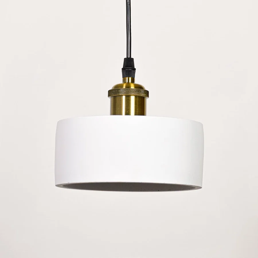 White metal pendant light with polished gold fittings designed for stylish contemporary spaces.